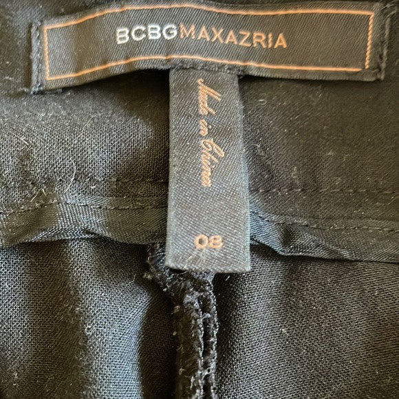 Black front pleat BCBGMaxazria skinny trouser with asymmetrical waist closure - Picture 4 of 5